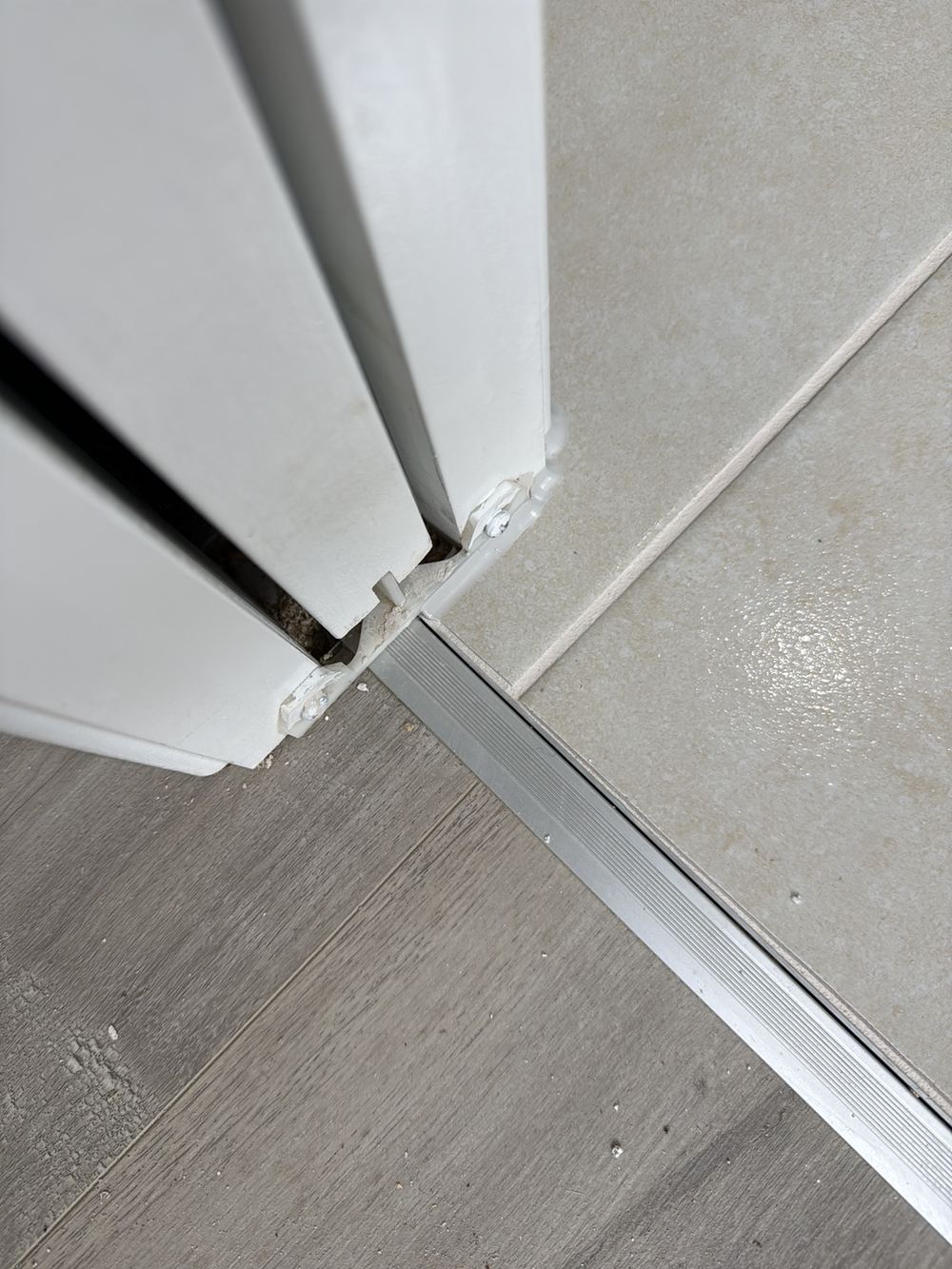 Water stop angle stopping short of the full perimeter it should cover, found during a pre-handover inspection in Berwick