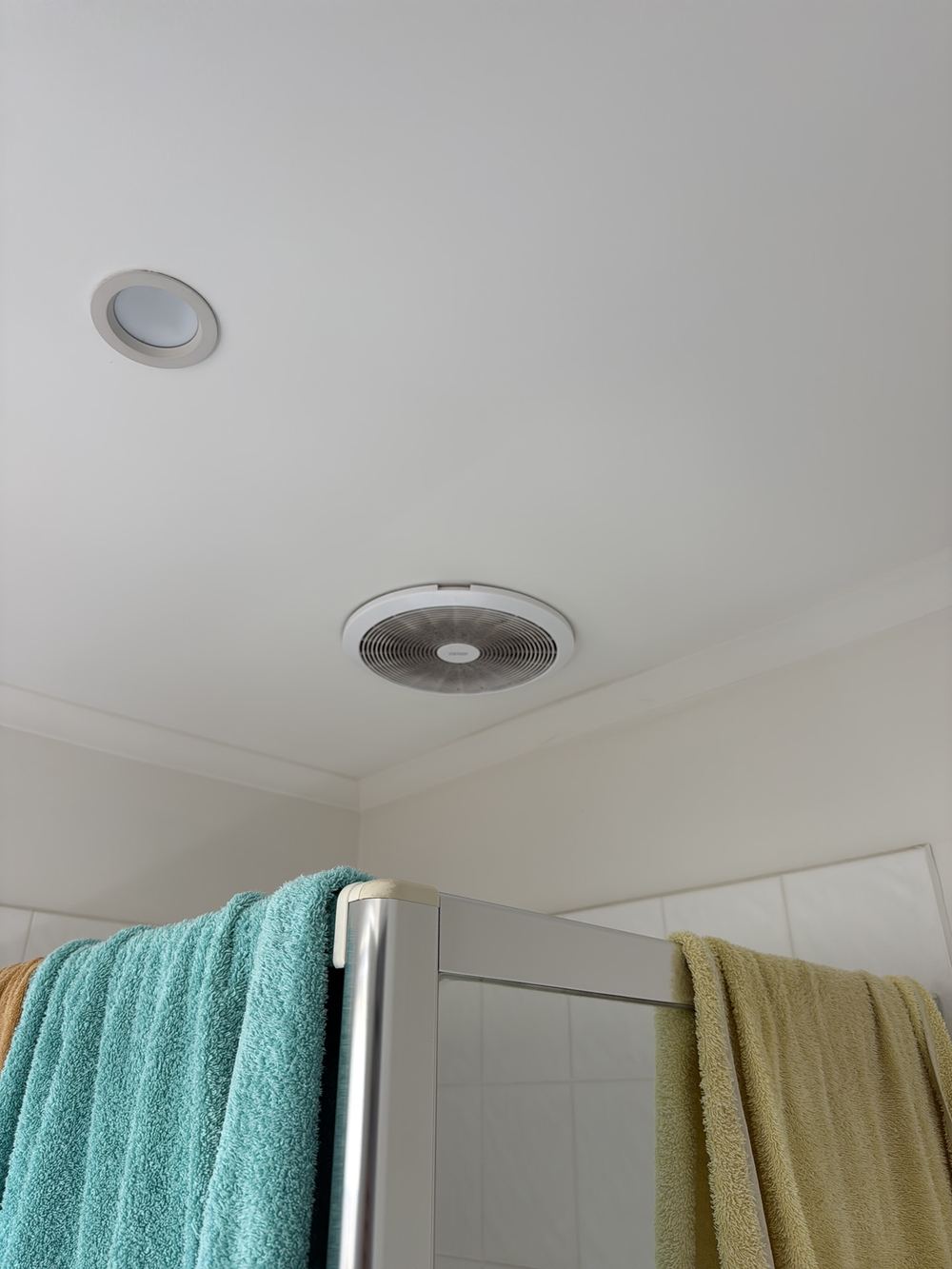 Bathroom exhaust fans discharging straight into the roof space, found during a pre-purchase inspection in Berwick