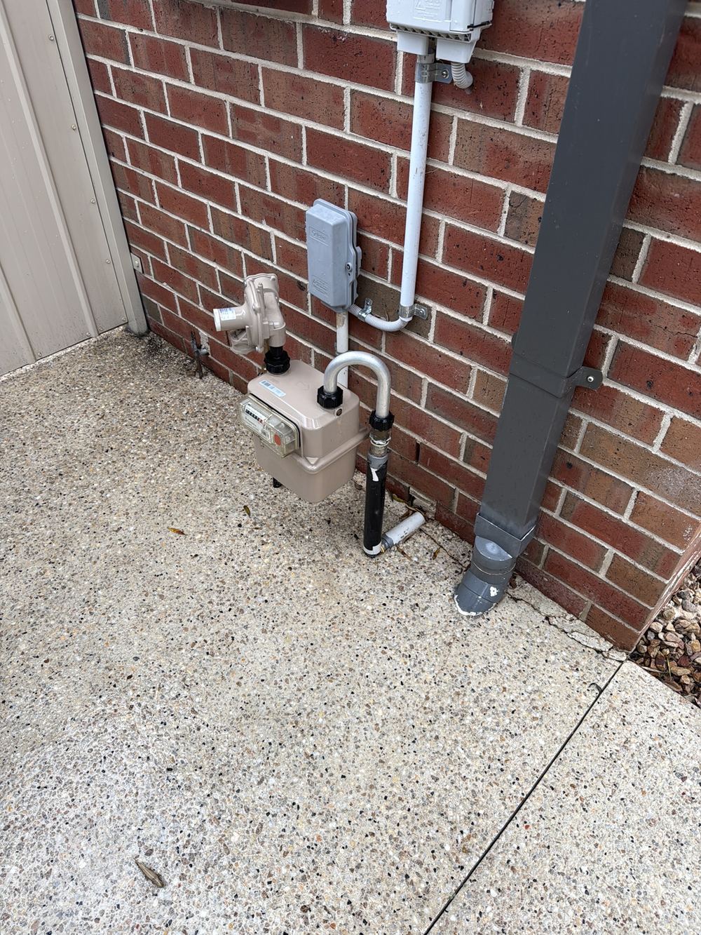 Exposed gas pipe in a material that breaks down in sunlight, found during a pre-purchase inspection in Berwick
