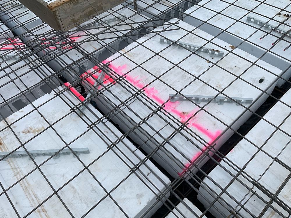 Beam narrowed where pods had shifted, below the width shown on the plans, found during a slab pre-pour inspection in Berwick