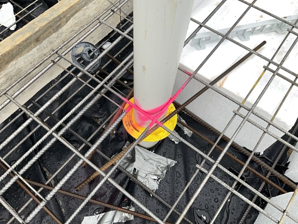 Reinforcement at the slab edge without enough concrete cover to protect it, Berwick
