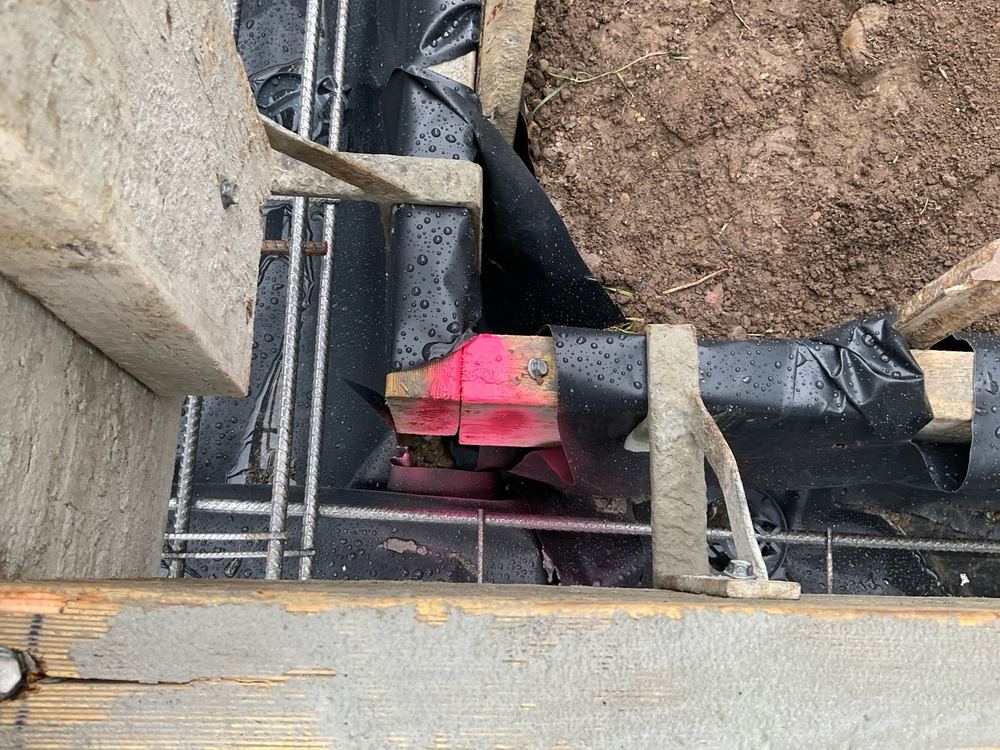 Vapour barrier joints left unsealed, giving ground moisture a way up, found during a slab pre-pour inspection in Berwick